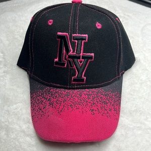 I’m selling a pink and black hat that has NY on it . Very nice